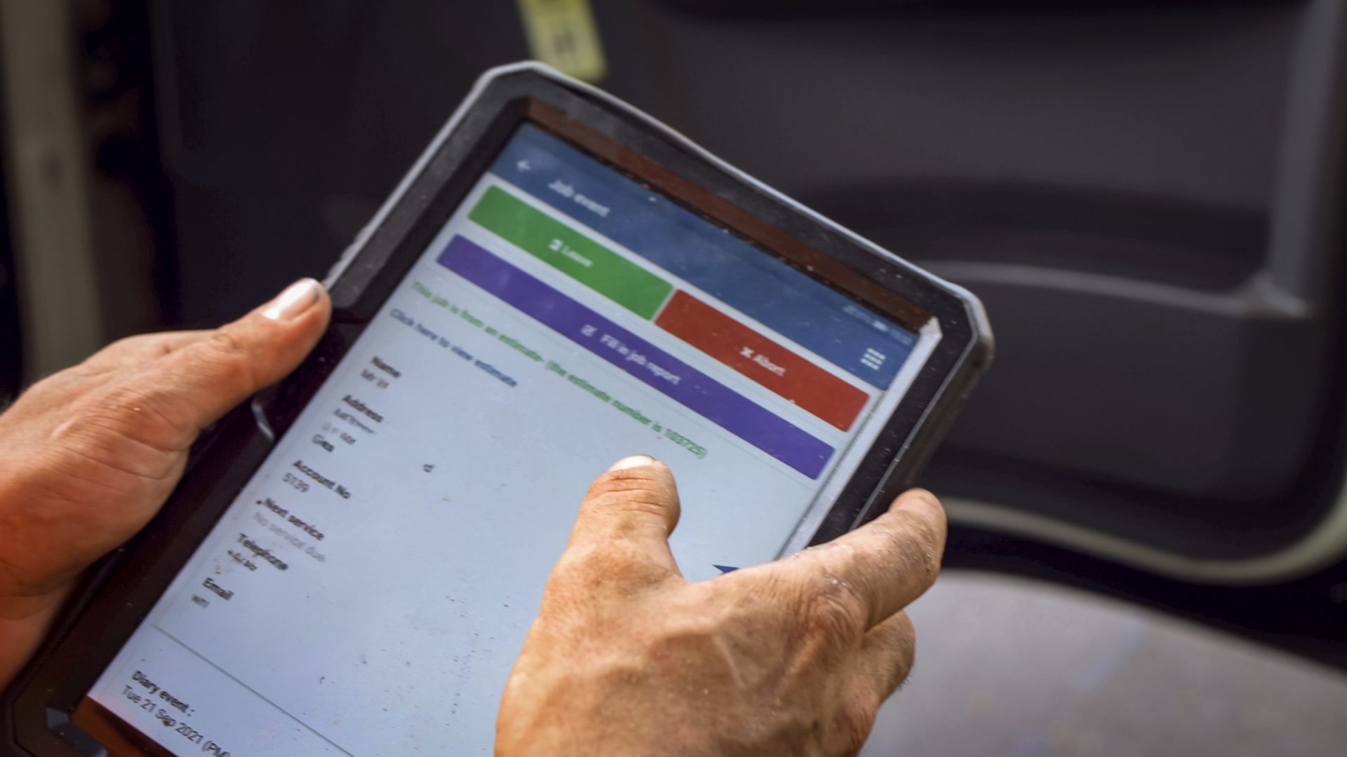 Ayrhsire engineer using Commusoft on a tablet device