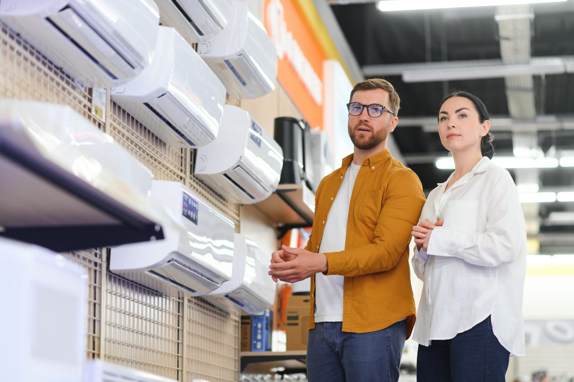 Two people shopping for a HVAC system