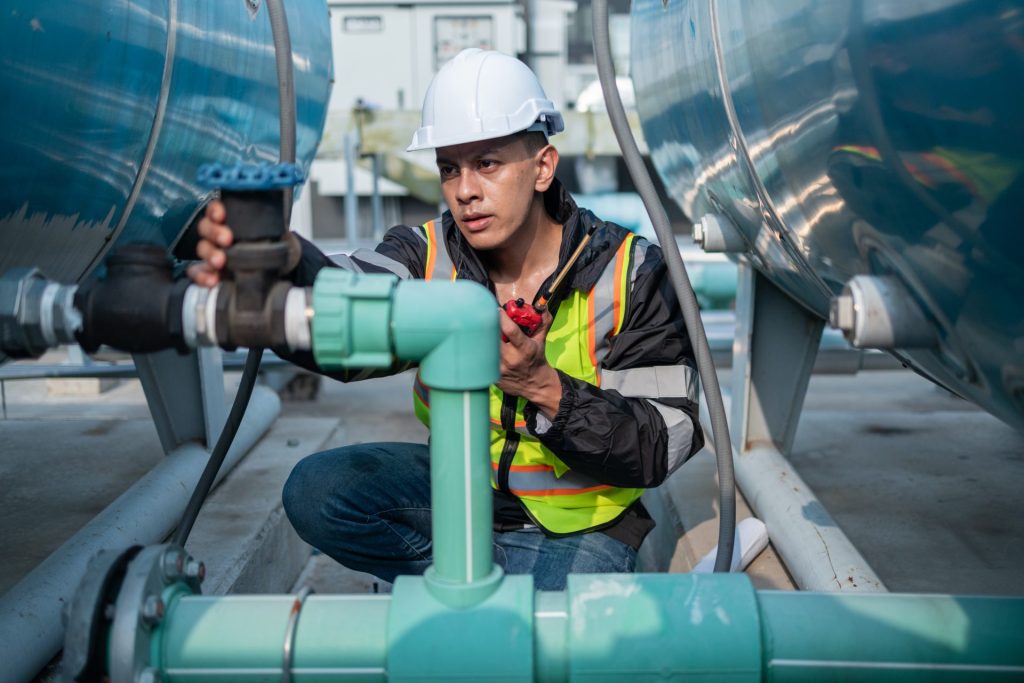 Engineer at work with a walkie talkie in his hand