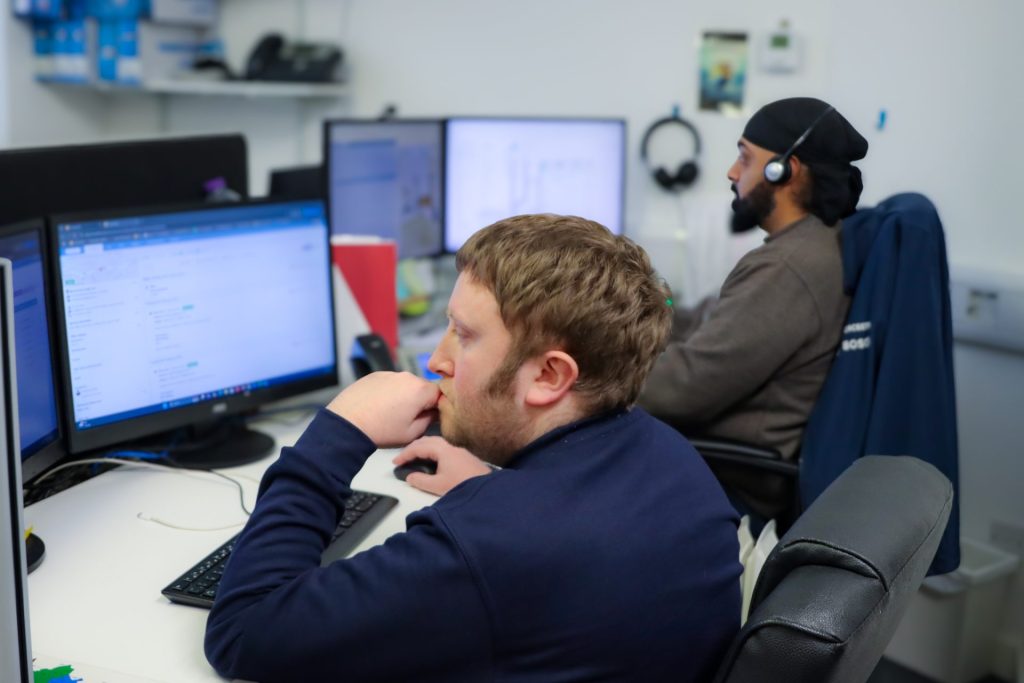 Employees working at their desks