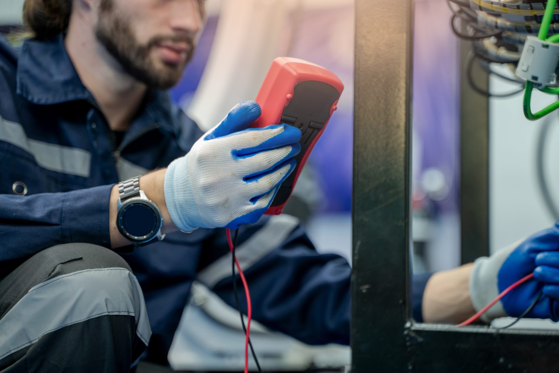 Engineer carrying out reading during job