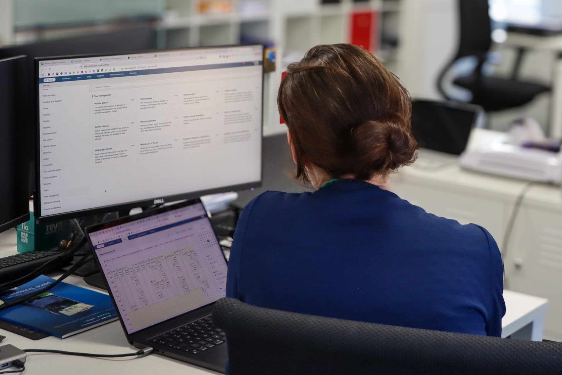 Employee working on Commusoft on desktop