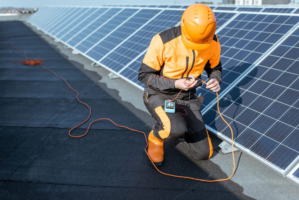 Electrician working on a solar station